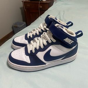 These are barley worn Nike Court Borough Mid 2s.